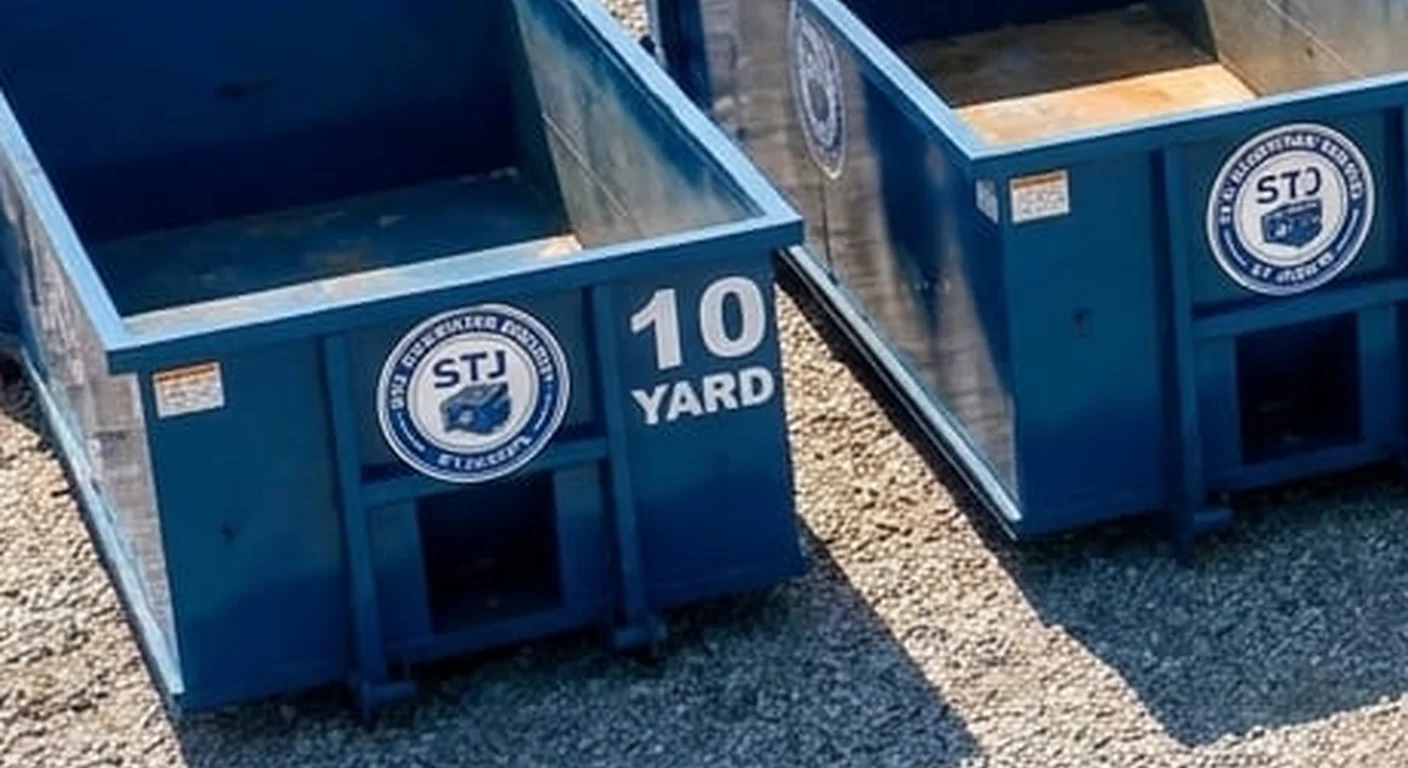 10 Yard Dumpster Rental in St. Joseph, MO A clean, correctly-labeled 10 yard STJ Dumpster Rental St Joseph roll-off container staged at the company yard, part of a five-container size lineup